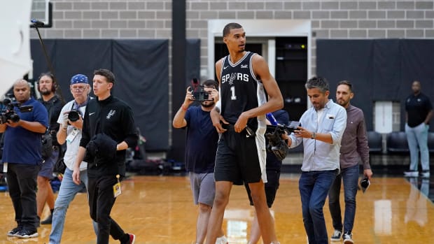 San Antonio Spurs center Victor Wembanyama enters the court during Media Day.